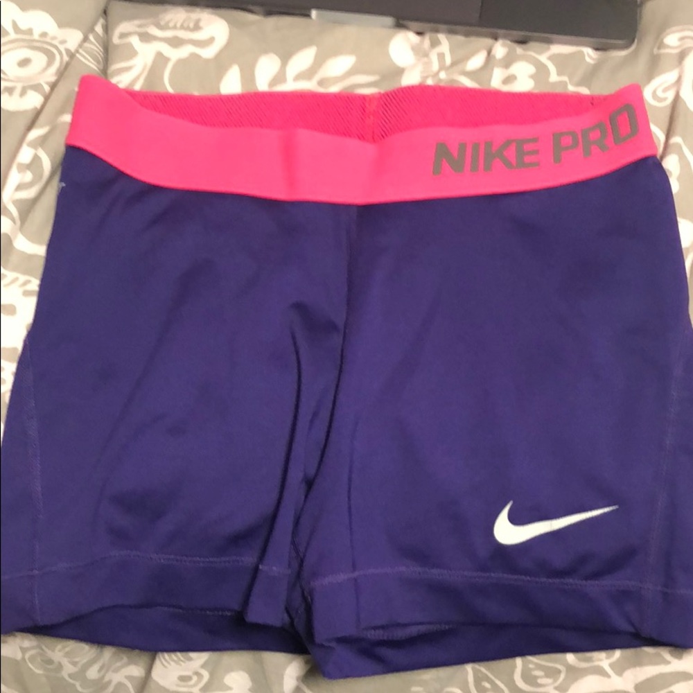 Purple Nike shorts